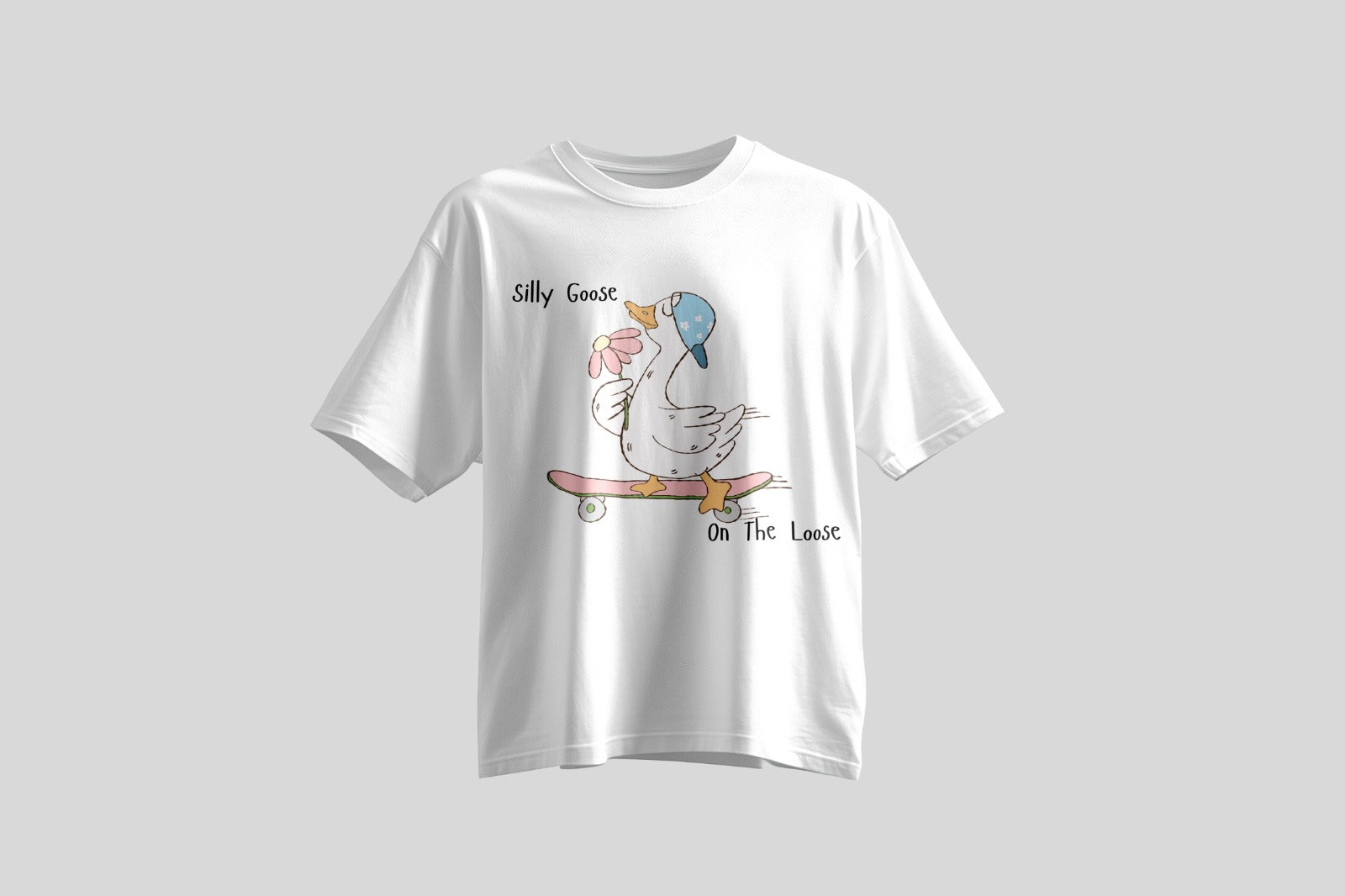 White t-shirt with a cartoon goose design on a gray background